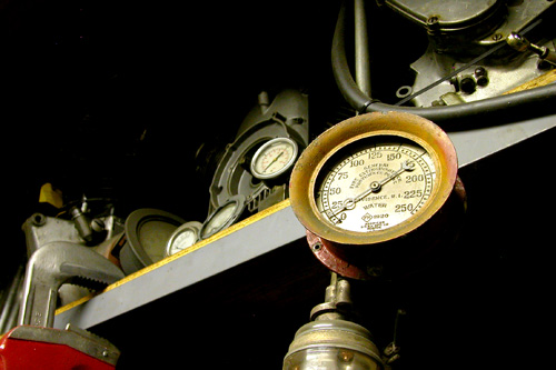 
                    Hamel is a vintage motorcycle engine collector.  The walls of the garage are filled with European engine brands such as Triumphs, Vincents and Velocettes.  Hamel also collects gauges.
                                            (Ariel Kitch)
                                        