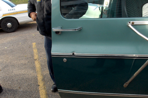 
                    Officers retrieved the stray bullet that went through this truck's door.  It was in near perfect condition, which helps the ballistics department identify the gun.
                                            (Marc Sanchez)
                                        