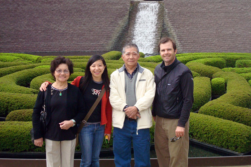 
                    Charlie Schroeder and Wendy Mok pose for a photo with Wendy's parents.
                                            (Courtesy Charlie Schroeder)
                                        